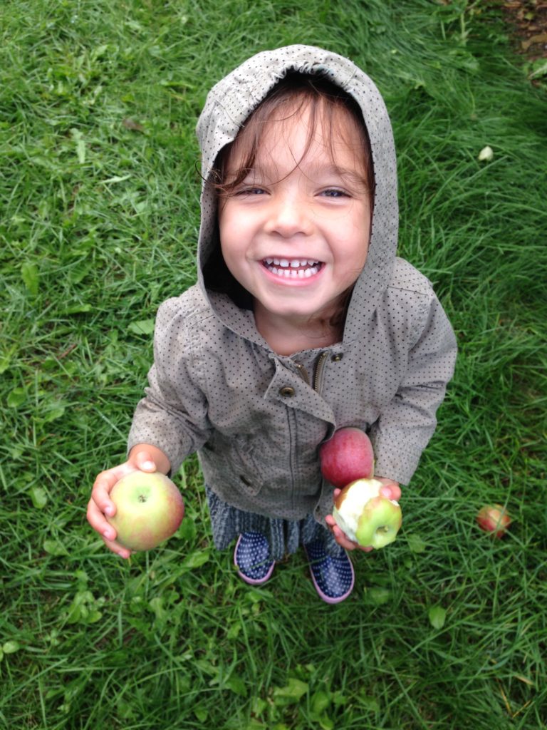 Girl eating apples